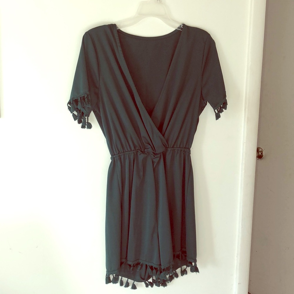 Emerald Green jumpsuit. New. Fits small medium.